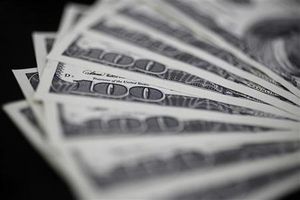 東京外為、1ドル=101円15~16銭