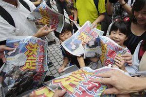 消費増税、デフレ脱却と財政再建の観点で首相が判断=官房長官