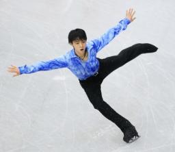 男子フリーで右手から流血しながらもこん身の演技を見せる高橋(撮影・浅見桂子)