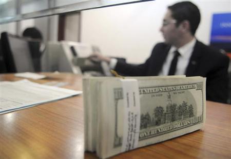 NY外為市場=ドル下落、弱い雇用統計受け一時103円台