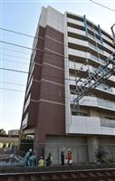 現場マンション保存工事が着工 一部遺族は反発