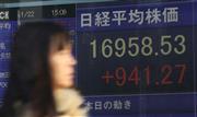 東京株急反発、終値９４１円高 追加緩和期待でリスク回避和らぐ